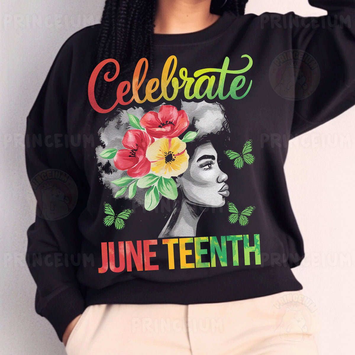 a woman wearing a black sweatshirt with flowers on it