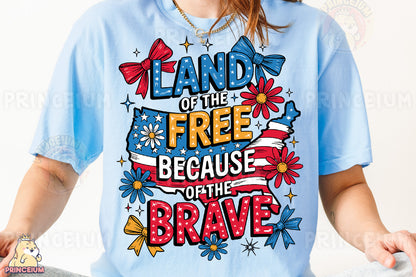 a woman wearing a t - shirt that says land of the free because of the