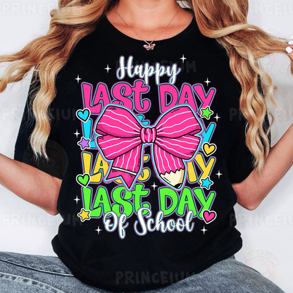 a woman wearing a happy last day last day of school tshirt