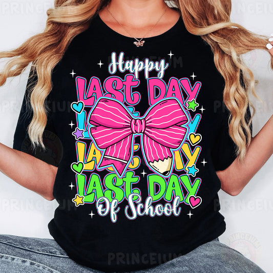 a woman wearing a happy last day last day of school tshirt