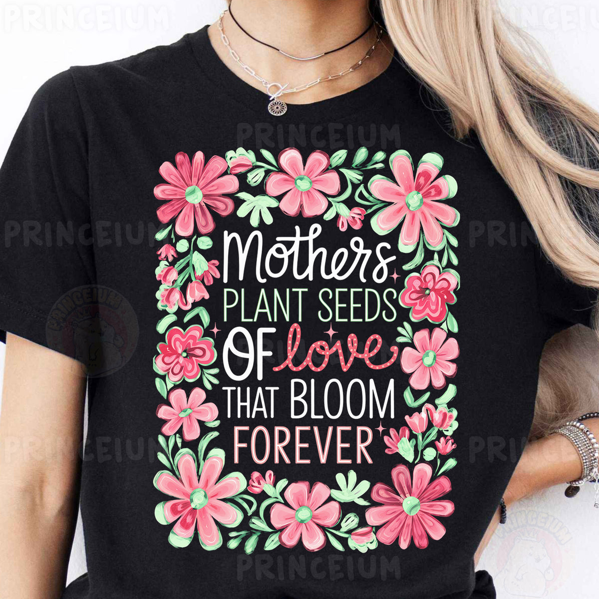 a woman wearing a t - shirt that says mothers plant seeds of love that bloom
