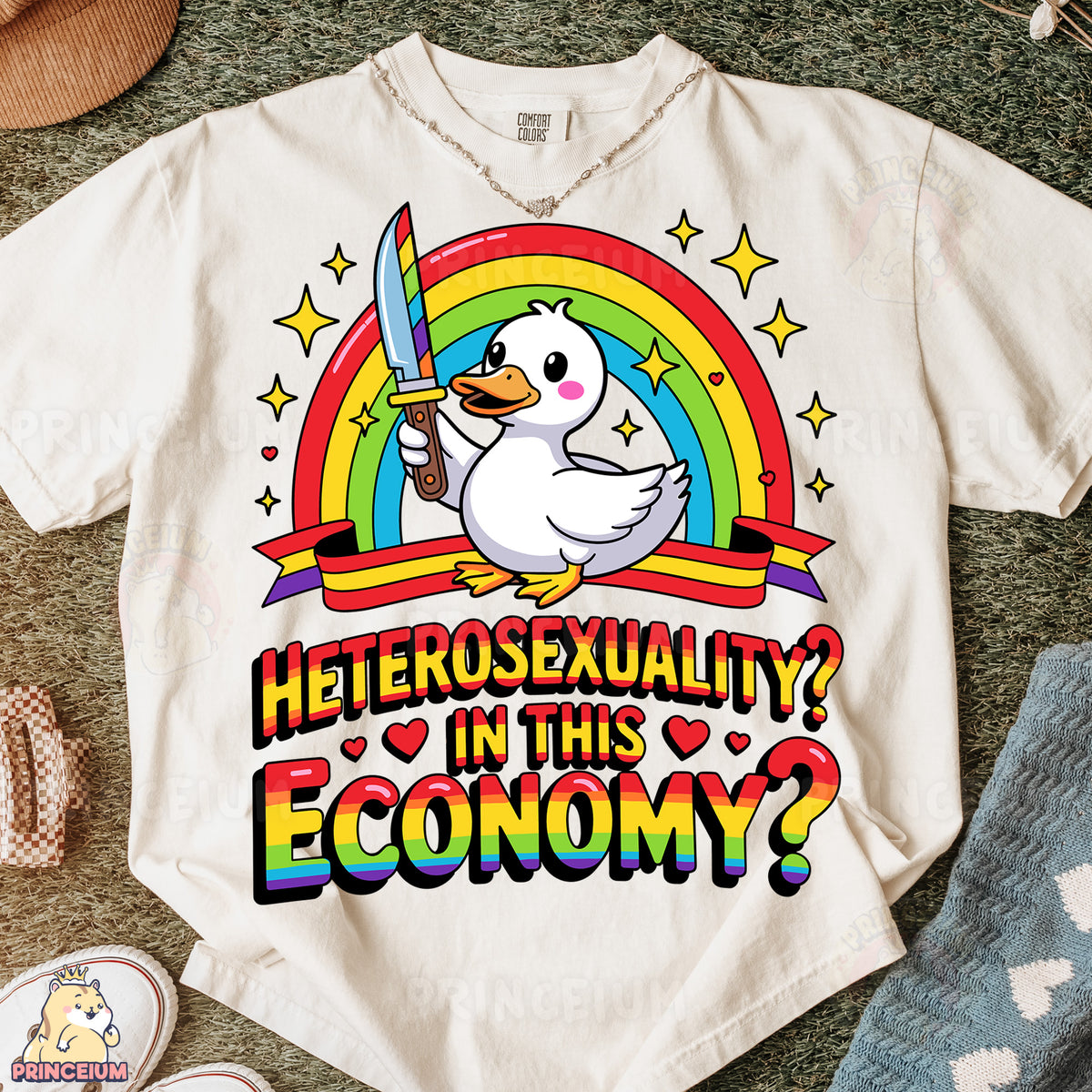 a t - shirt with a duck holding a knife in it