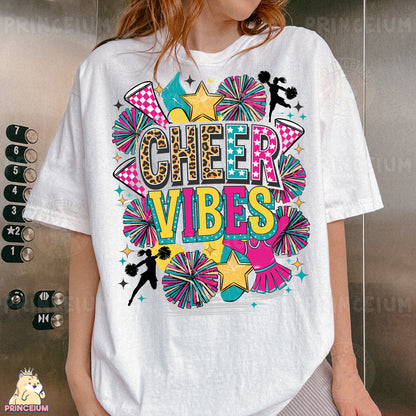 a woman wearing a cheer vibes t - shirt