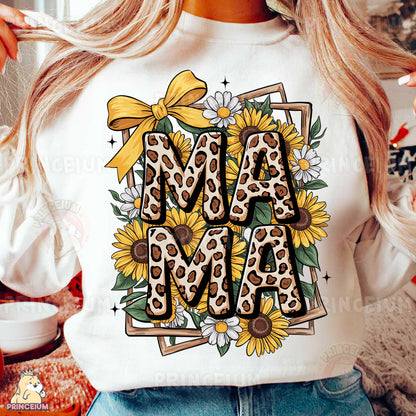 a woman wearing a white shirt with the word ma ma on it