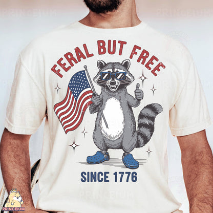 a man wearing a t - shirt with a raccoon holding an american flag