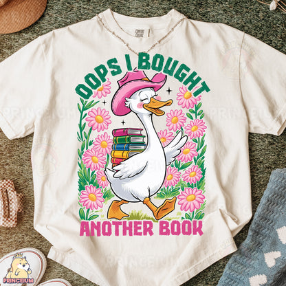 a white shirt with a duck wearing a pink hat