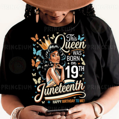 a woman wearing a black shirt and a hat holding a cell phone
