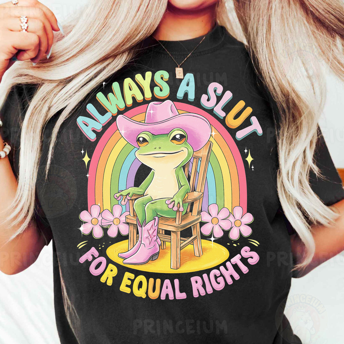 a woman wearing a black shirt with a frog on it