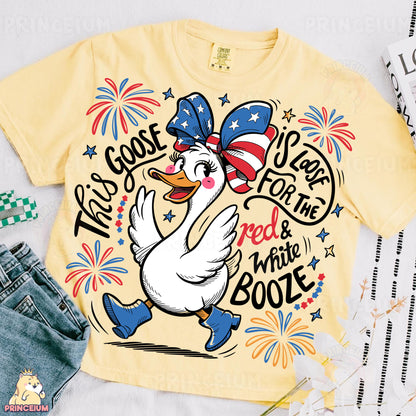 a t - shirt with a cartoon duck wearing a patriotic hat