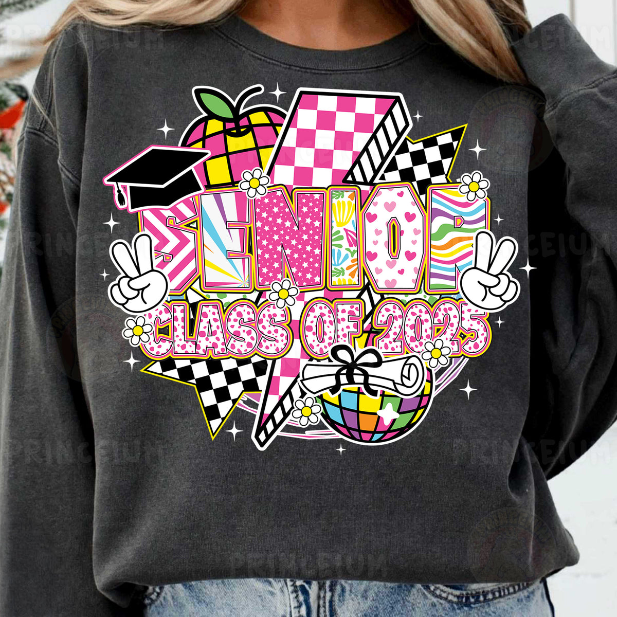 a woman wearing a black sweatshirt with a colorful graphic on it