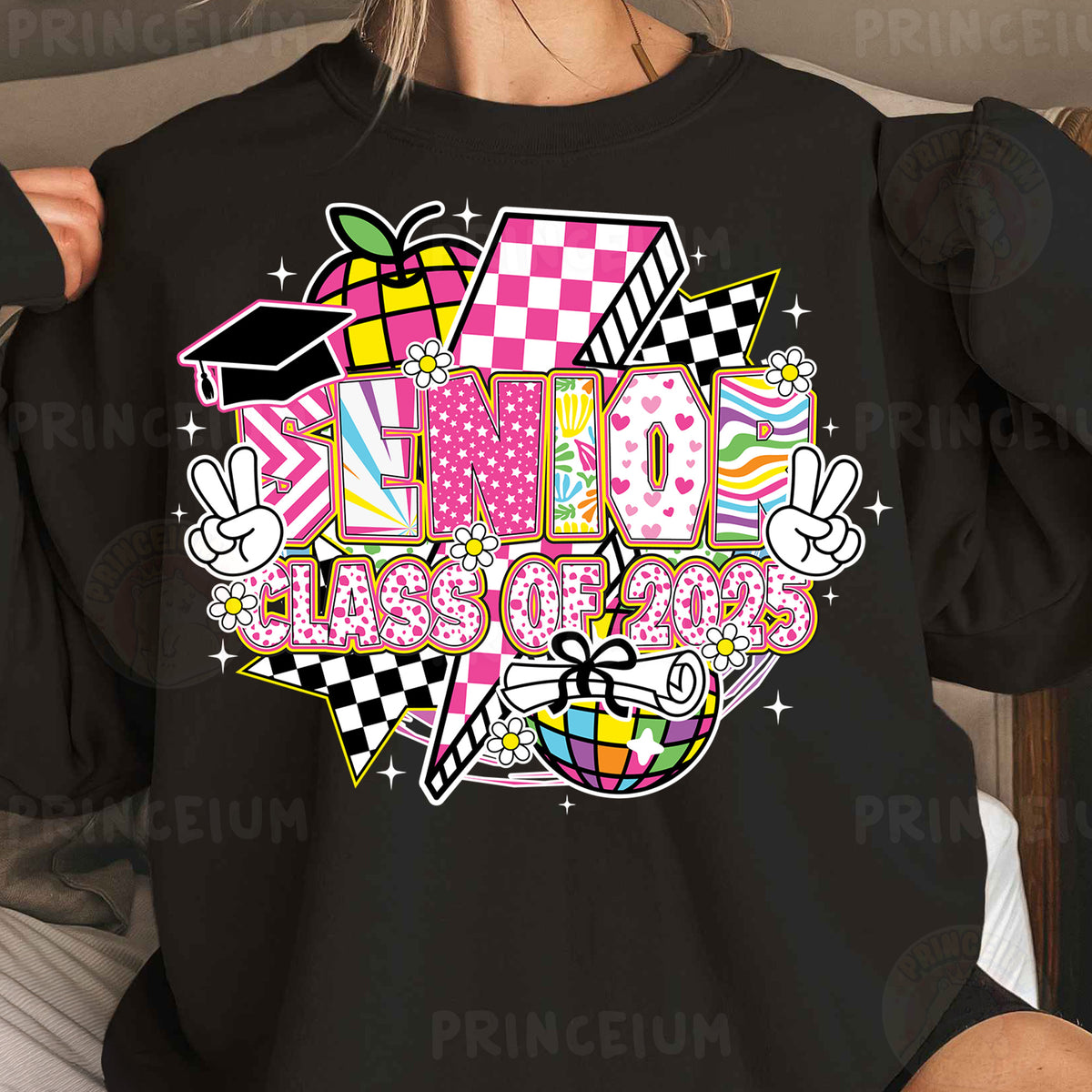 a woman wearing a black shirt with a pink and white checkered design