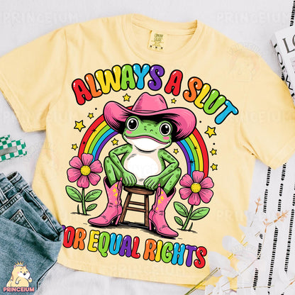 a yellow shirt with a frog wearing a pink cowboy hat