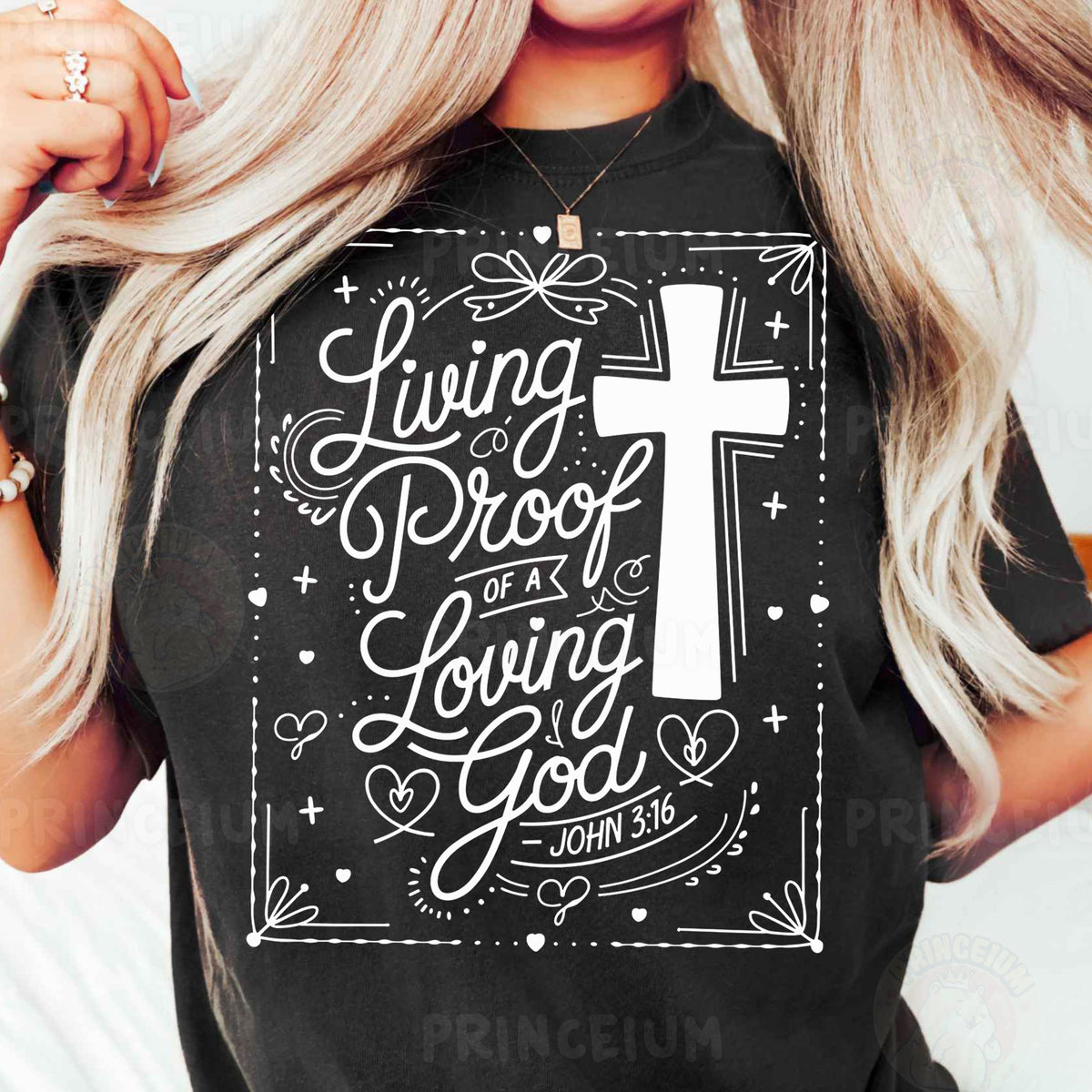 a woman wearing a black t - shirt with a cross on it