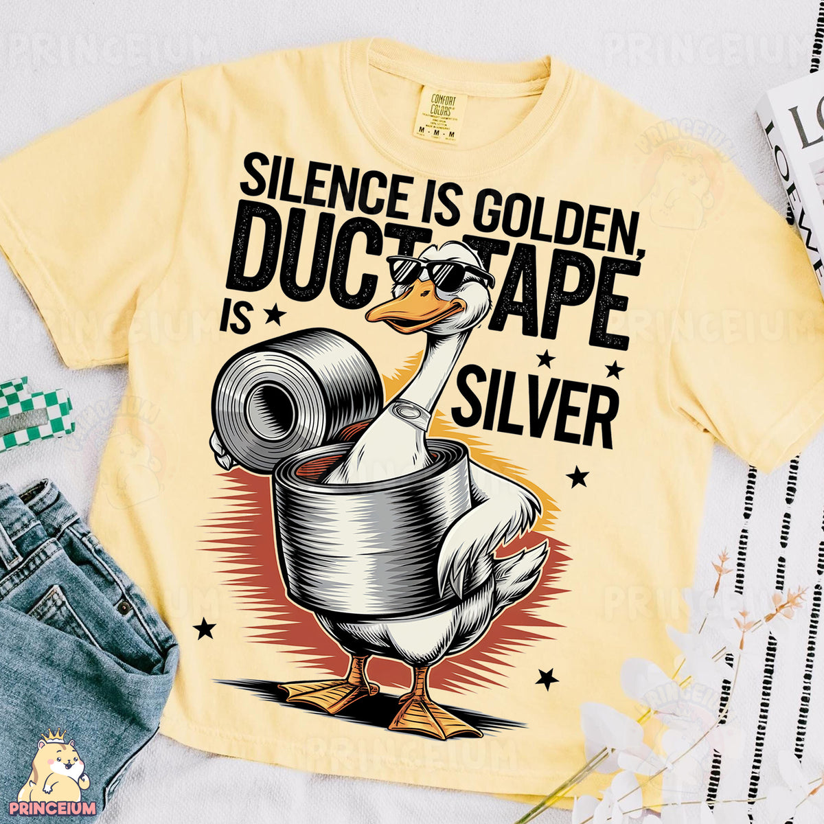 a t - shirt with a duck holding a roll of duct tape