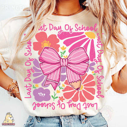 a woman wearing a t - shirt with a pink bow on it