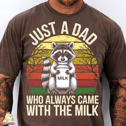 a man wearing a brown shirt with a raccoon on it