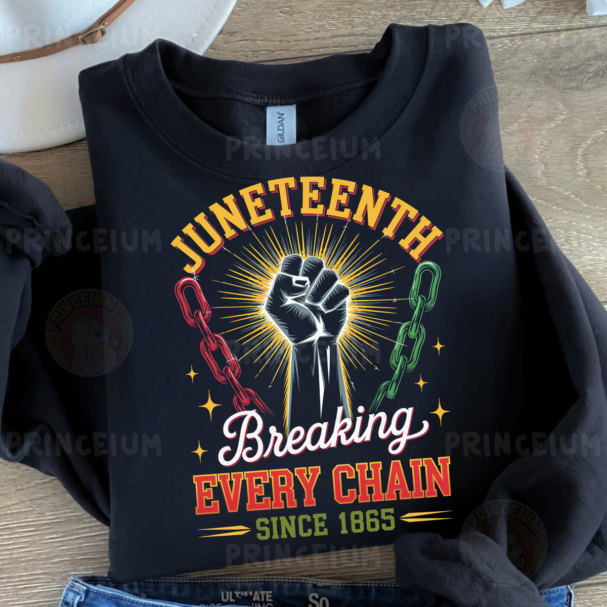 a black t - shirt with the words juneteeth breaking every chain since 1876