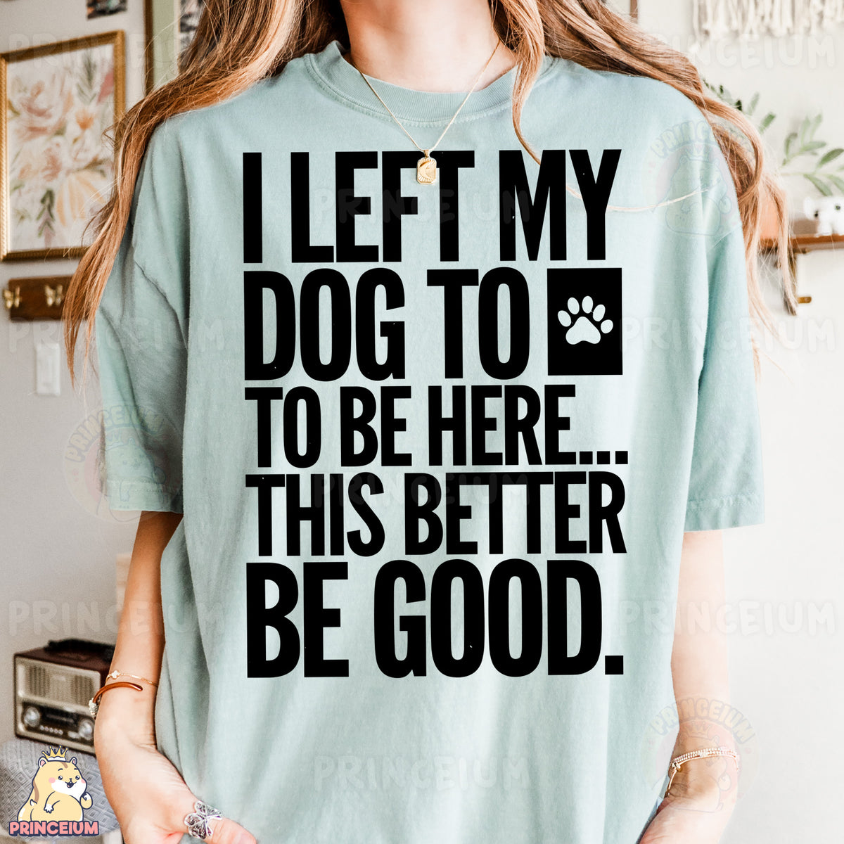 a woman wearing a t - shirt that says i left my dog to be here