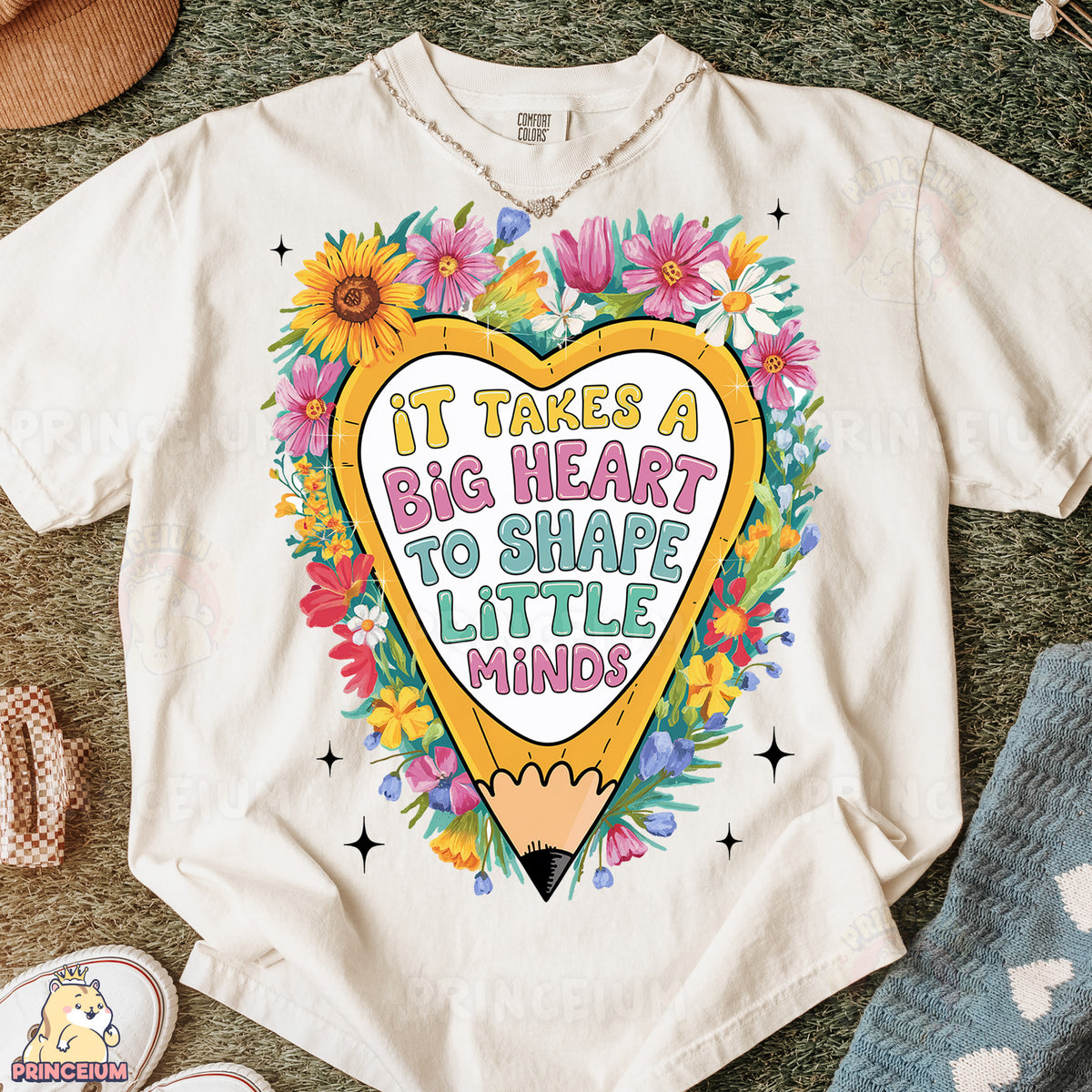 a t - shirt that says it takes a big heart to shape little minds