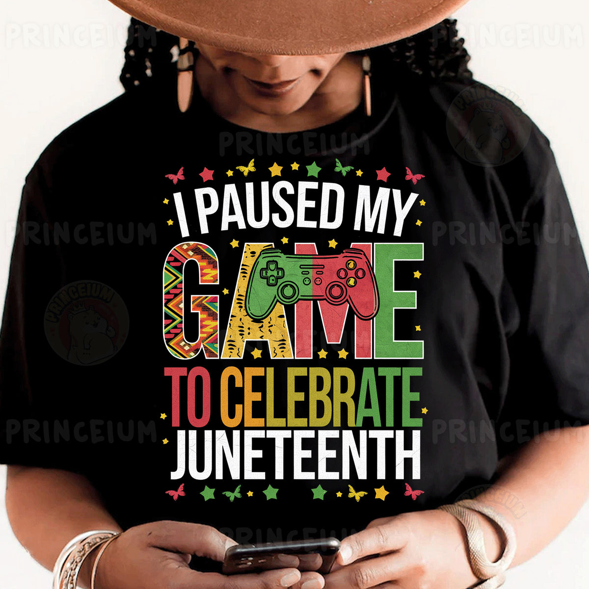 a person wearing a black shirt and a hat holding a cell phone