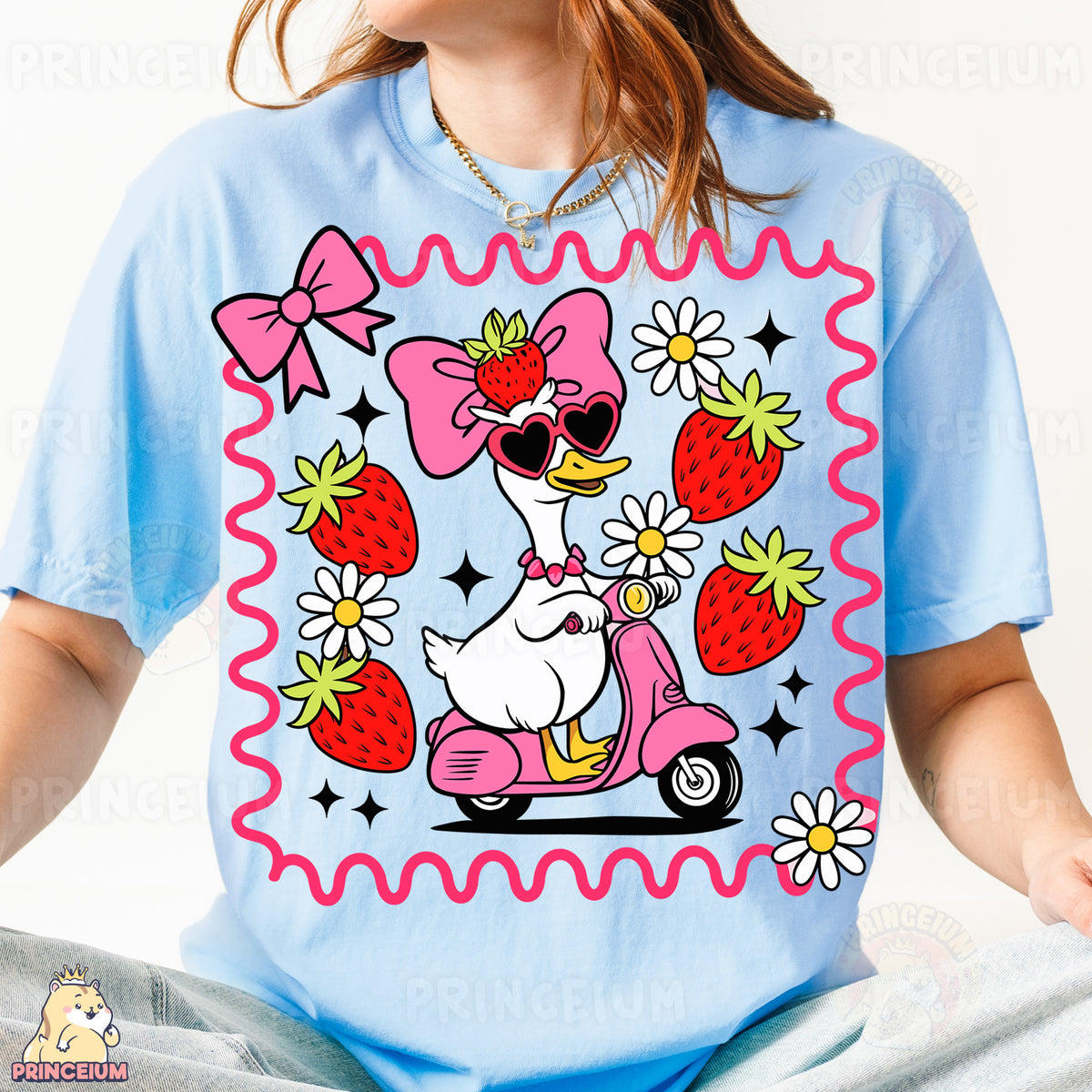 a woman wearing a t - shirt with a duck riding a scooter