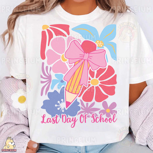 a woman wearing a t - shirt that says last day of school