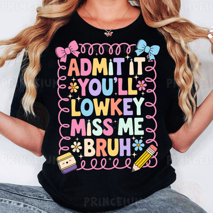 a woman wearing a t - shirt that says admit it you'll lowk