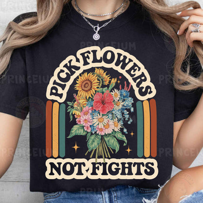 a woman wearing a black t - shirt that says rock flowers not fights
