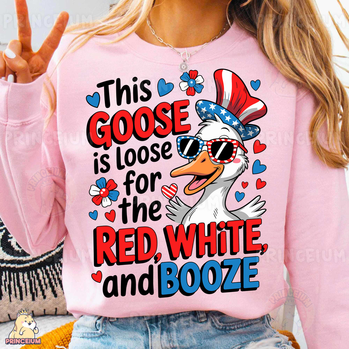 a woman wearing a pink shirt that says goose is loose for the red white and