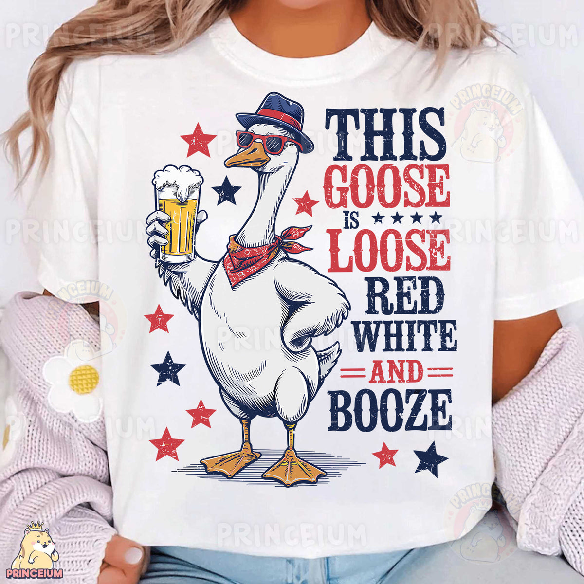 a woman wearing a t - shirt with a goose wearing a hat and holding a