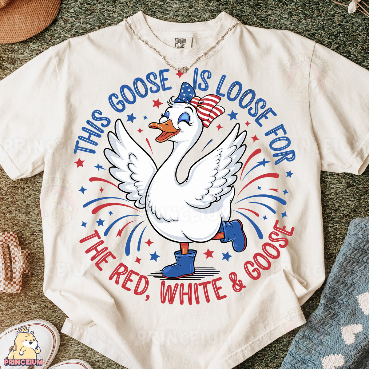 a white t - shirt with a goose is looking for the red, white and