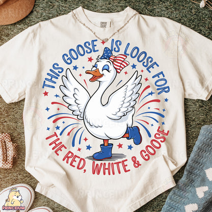 a white t - shirt with a goose is looking for the red, white and