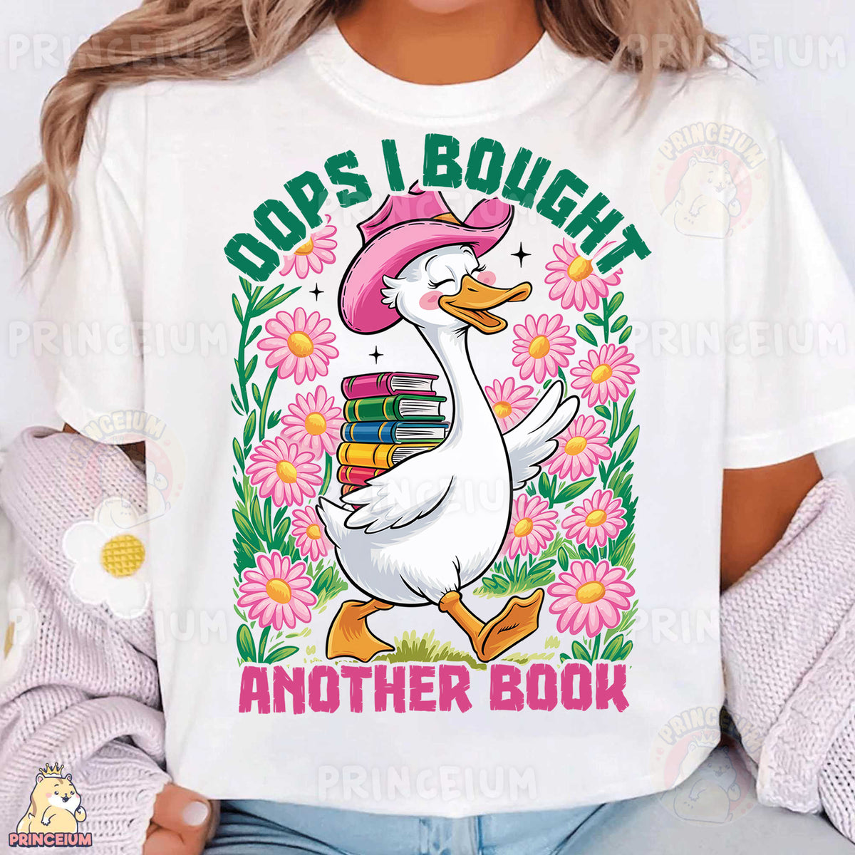 a woman wearing a white t - shirt with a duck reading a book