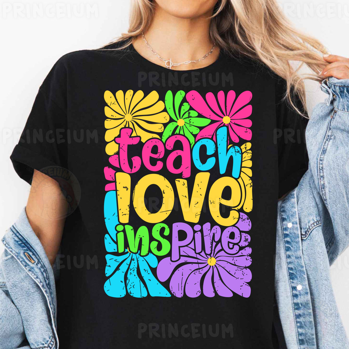 a woman wearing a t - shirt that says teach love