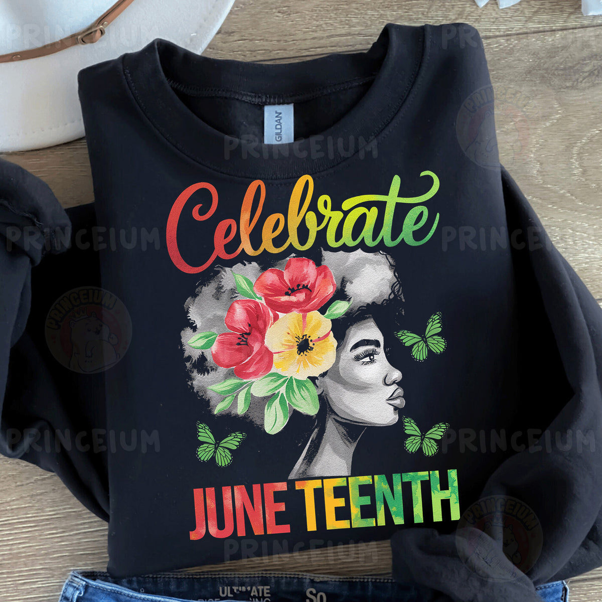 a black t - shirt with a picture of a woman's face and flowers