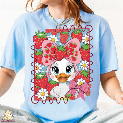 a girl wearing a t - shirt with a picture of a duck wearing a bow