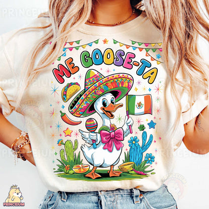 a woman wearing a t - shirt with a duck wearing a sombrero