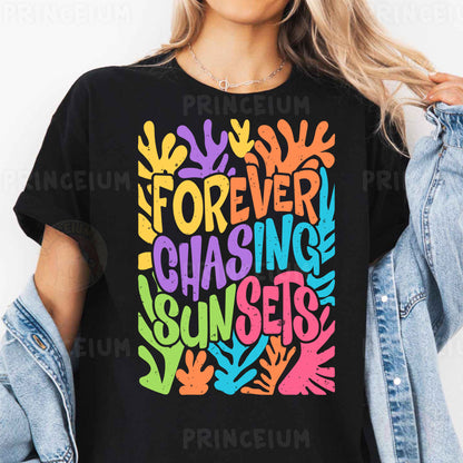 a woman wearing a black t - shirt that says forever chasing sunsets